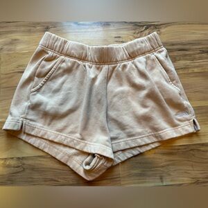 The North Face Women's Fleece Athletic Shorts in Light Orange